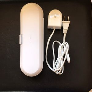 Phillips electric toothbrush charger and hard carrying case